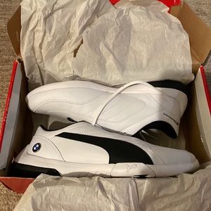These are BMW Pumas,  color is black and white, size is a 5.5 in US.